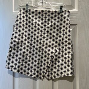 Multi colored skirt with slit.